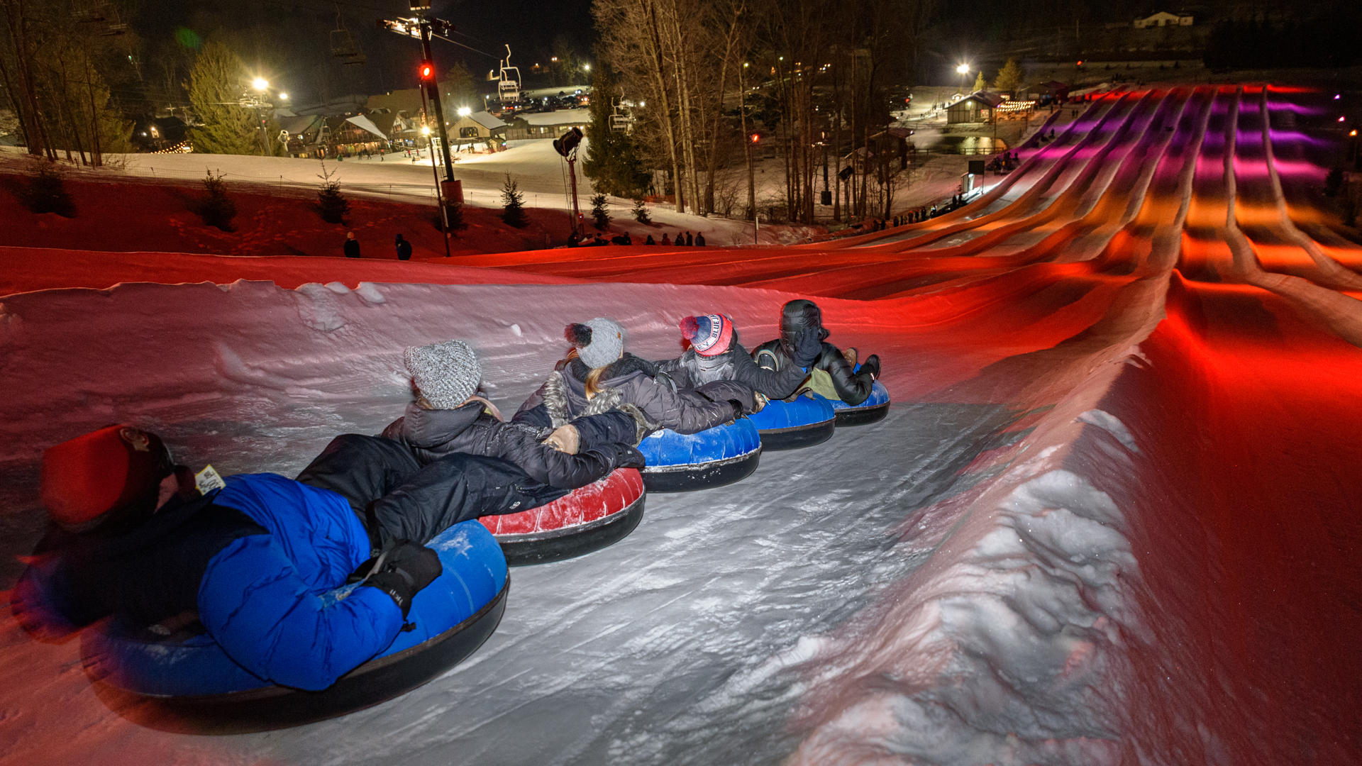 Glow Tubing during Will Tube For Food Under Glow Tubing LED Lights at Snow Trails Vertical Descent Tubing Park